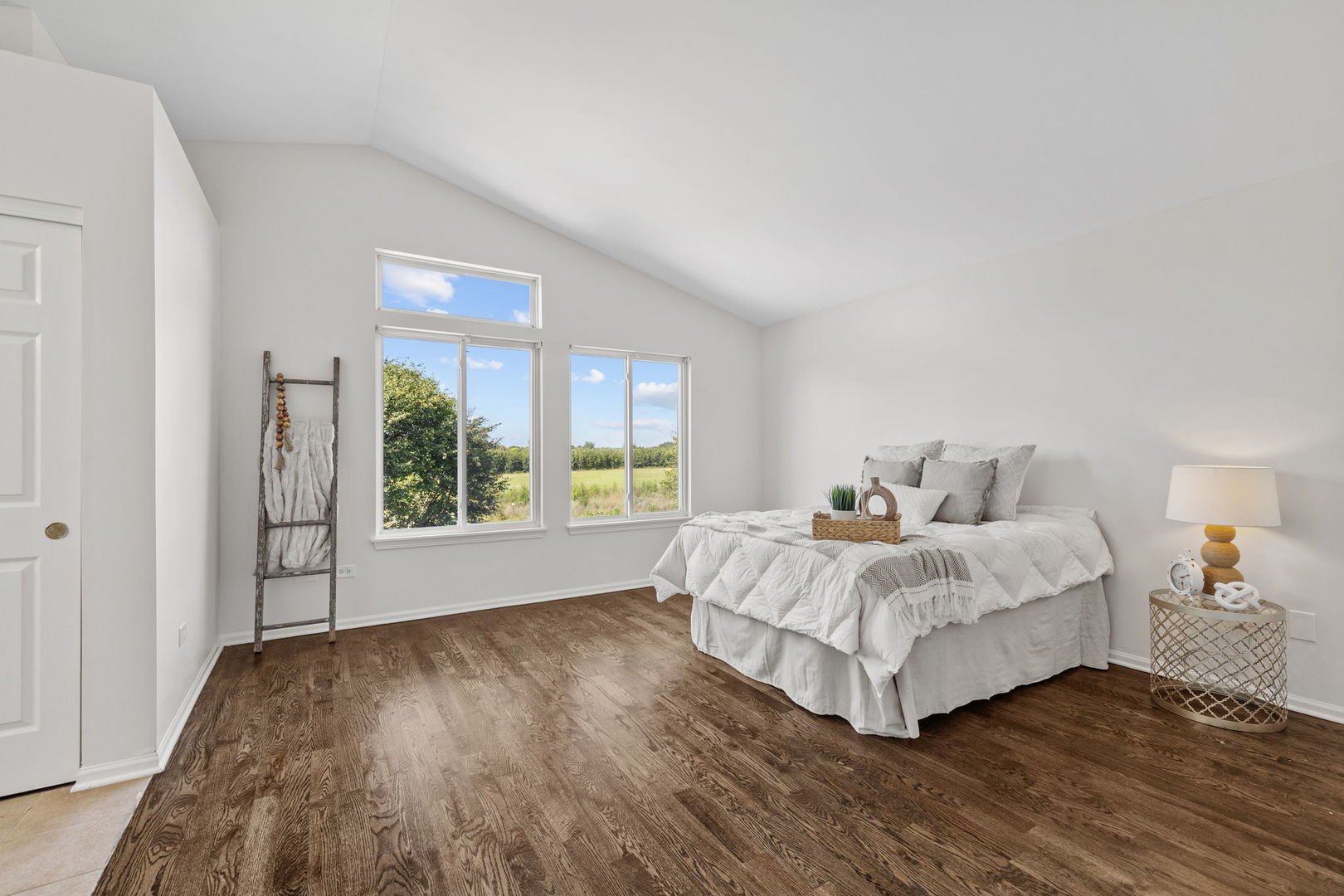 147 Willow Bend Bolingbrook, IL 60490 - Photo 12 of 22 a spacious bedroom with a bed and a large window