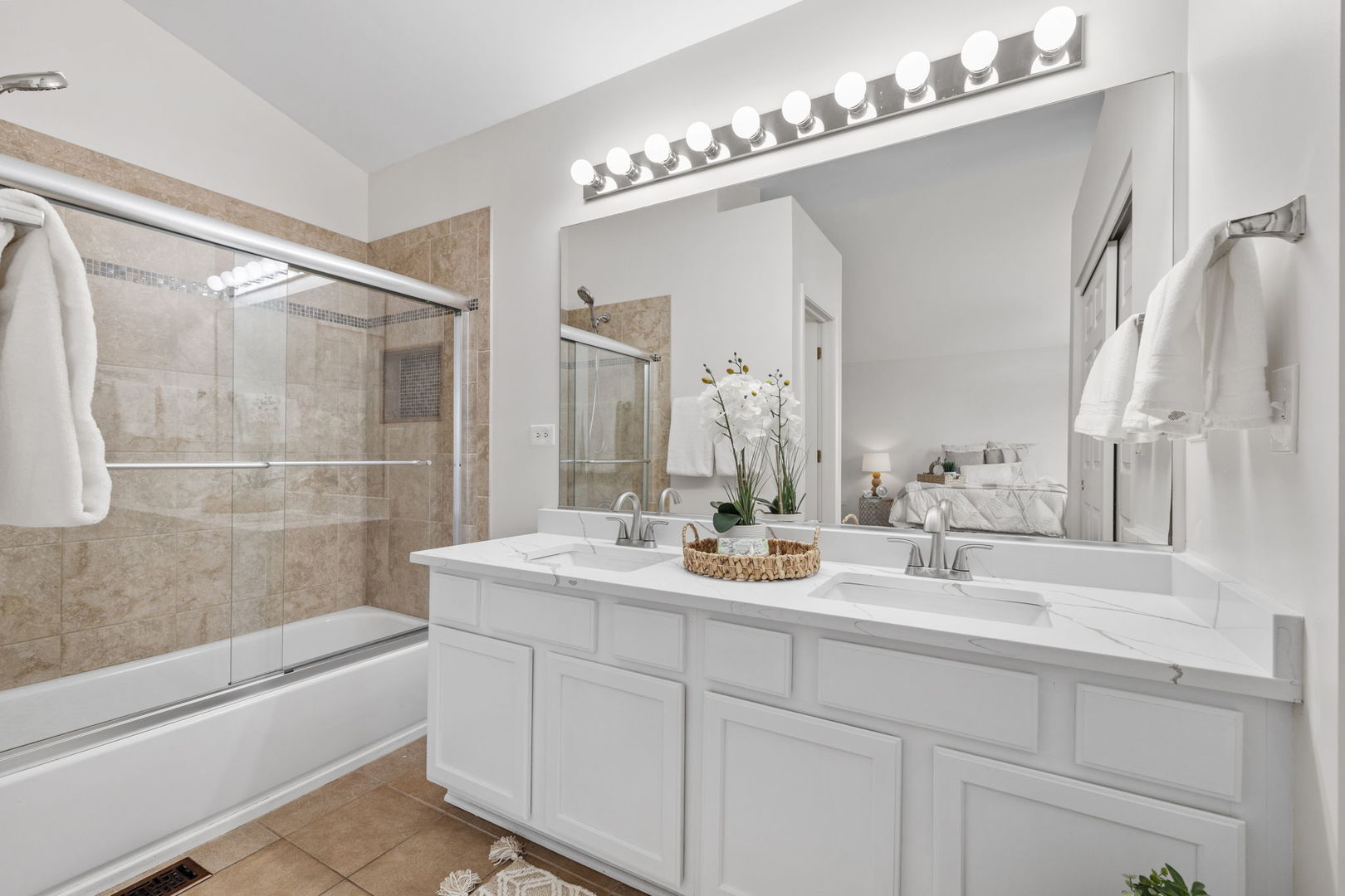 147 Willow Bend Bolingbrook, IL 60490 - Photo 14 of 22 a bathroom with a double vanity sink mirror and bathtub