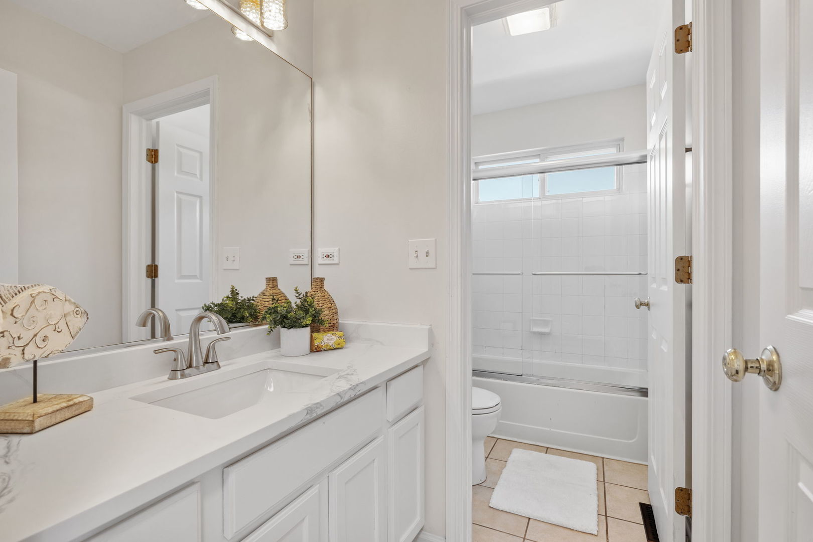 147 Willow Bend Bolingbrook, IL 60490 - Photo 19 of 22 a bathroom with a sink and a mirror
