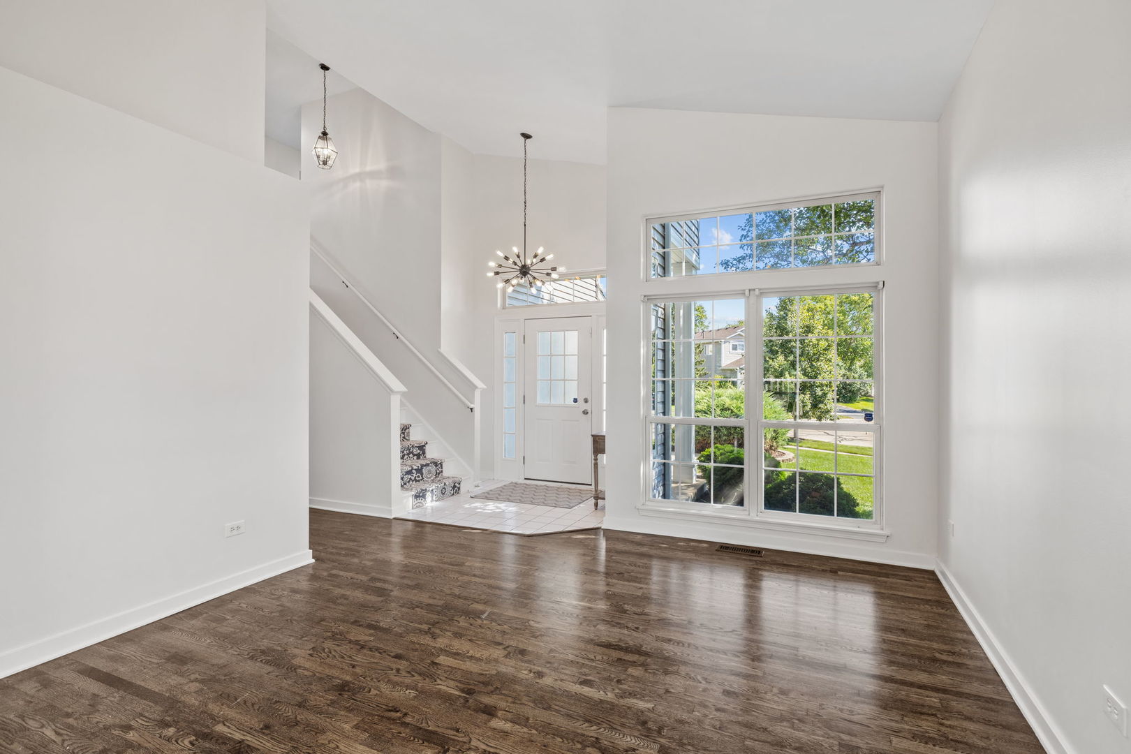 147 Willow Bend Bolingbrook, IL 60490 - Photo 3 of 22 an empty room with wooden floor and windows