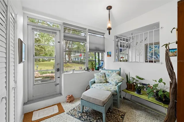 a bedroom with a bed and a desk