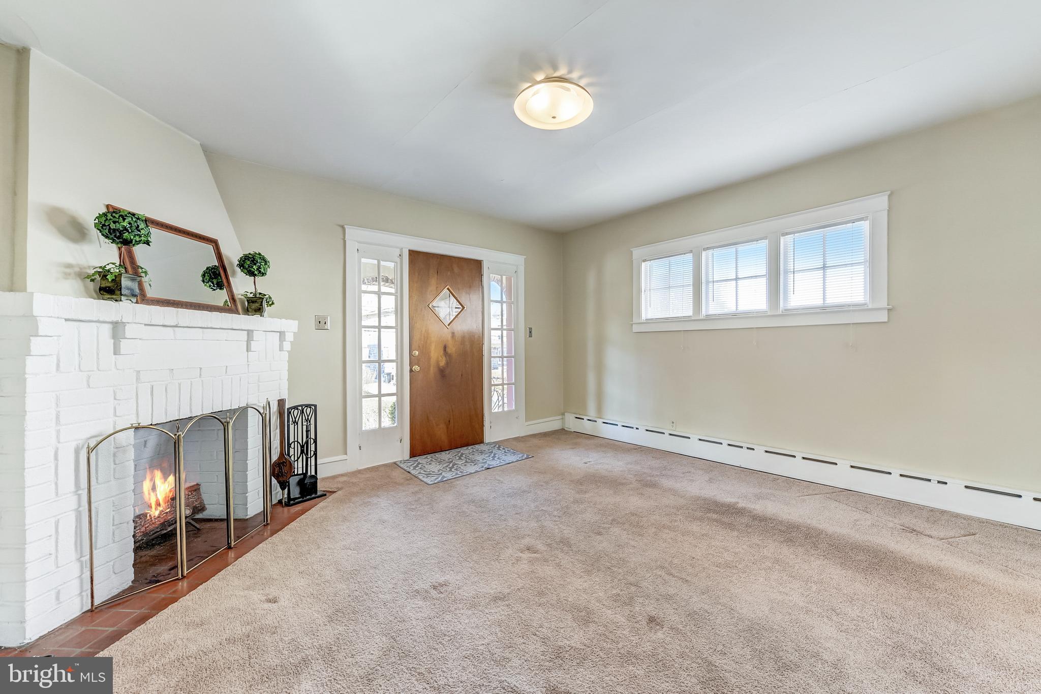 357 East County Line Road Ardmore, PA 19003 - Photo 5 of 27 Charming fireplace in living room