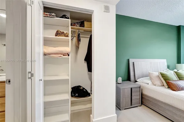 a view of bedroom and bathroom
