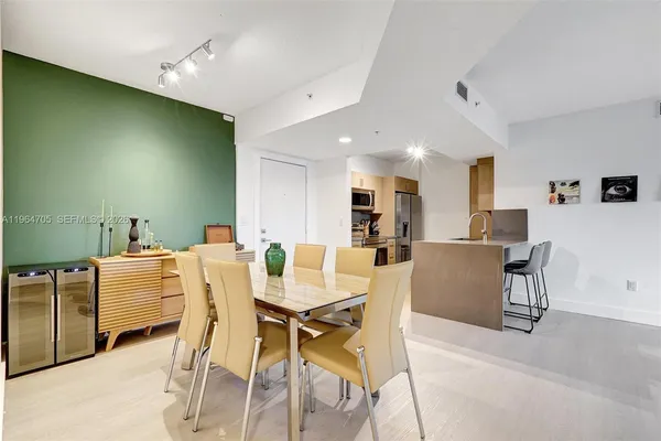 a view of a dining room with furniture