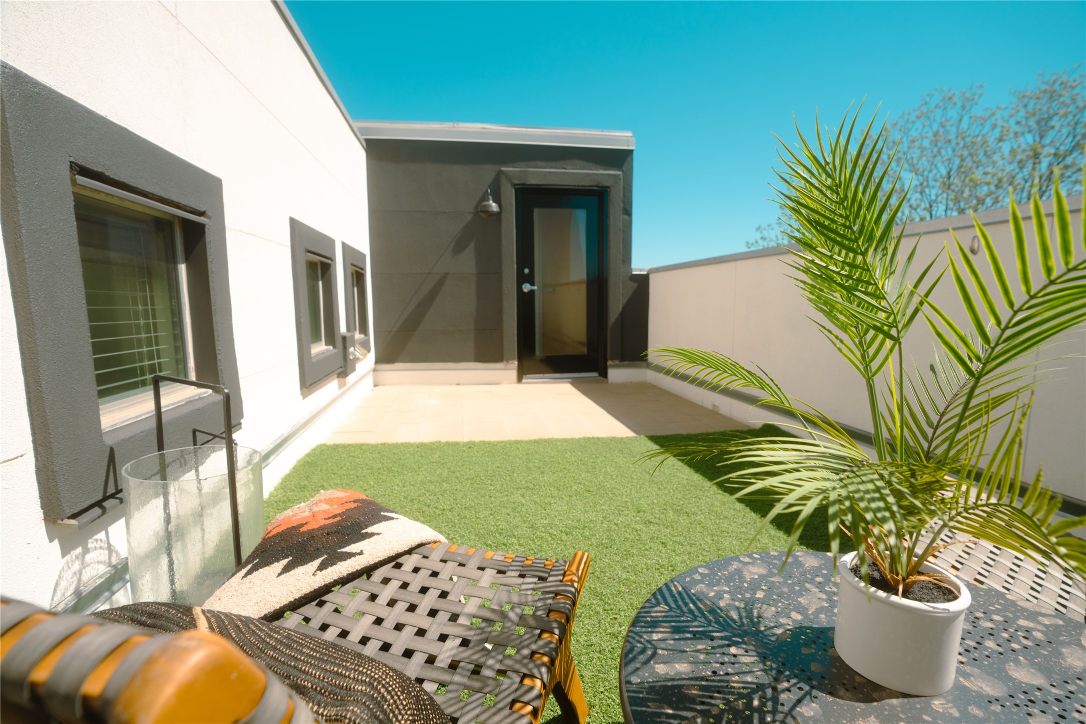 4801 South Congress Avenue, Unit H5 Austin, TX 78745 - Photo 3 of 39 View of yard with a patio