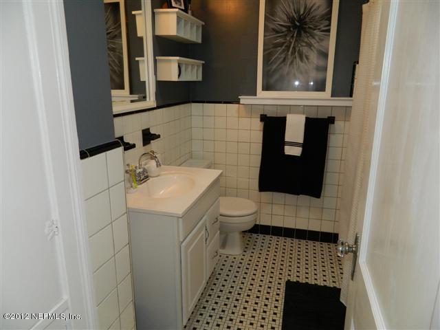 2231 Southampton Road Jacksonville, FL 32207 - Photo 12 of 23 a bathroom with a sink and a toilet