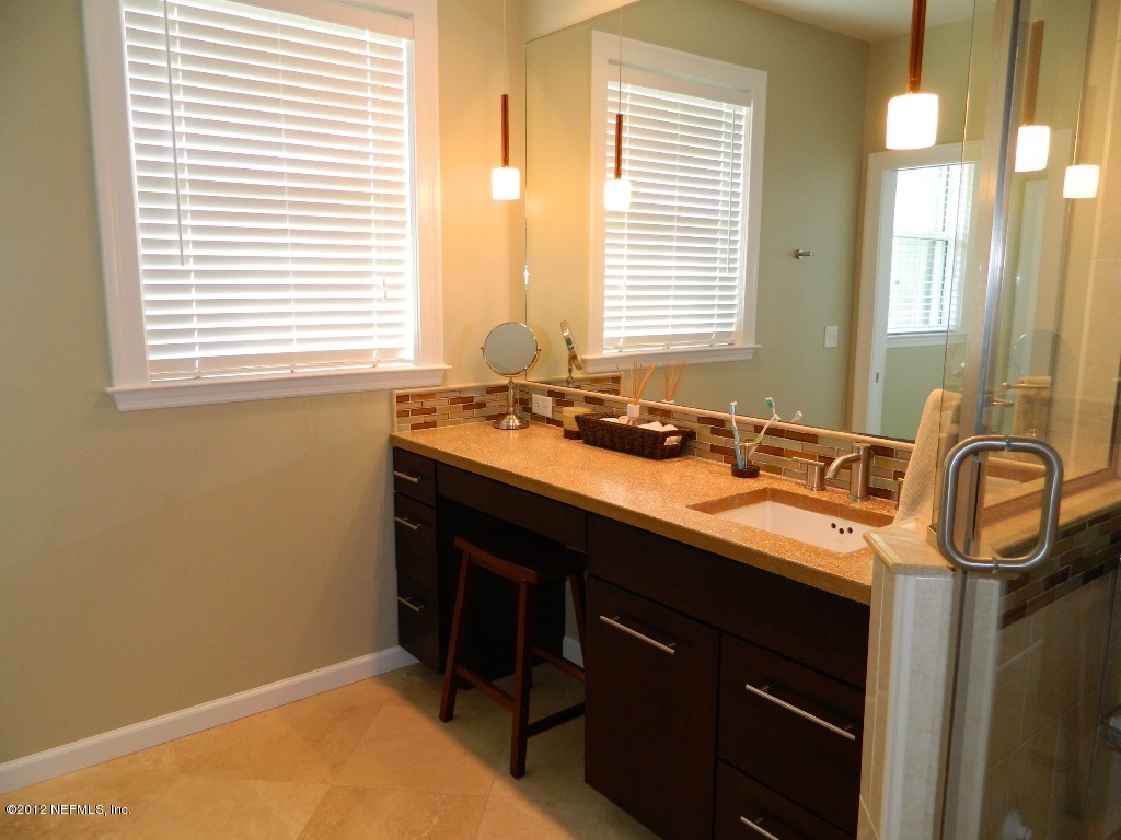 2231 Southampton Road Jacksonville, FL 32207 - Photo 17 of 23 a bathroom with a sink and a window