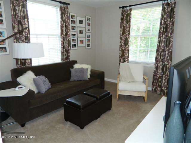 2231 Southampton Road Jacksonville, FL 32207 - Photo 20 of 23 a living room with furniture and a window