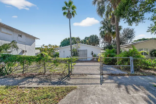 a house view with a garden space