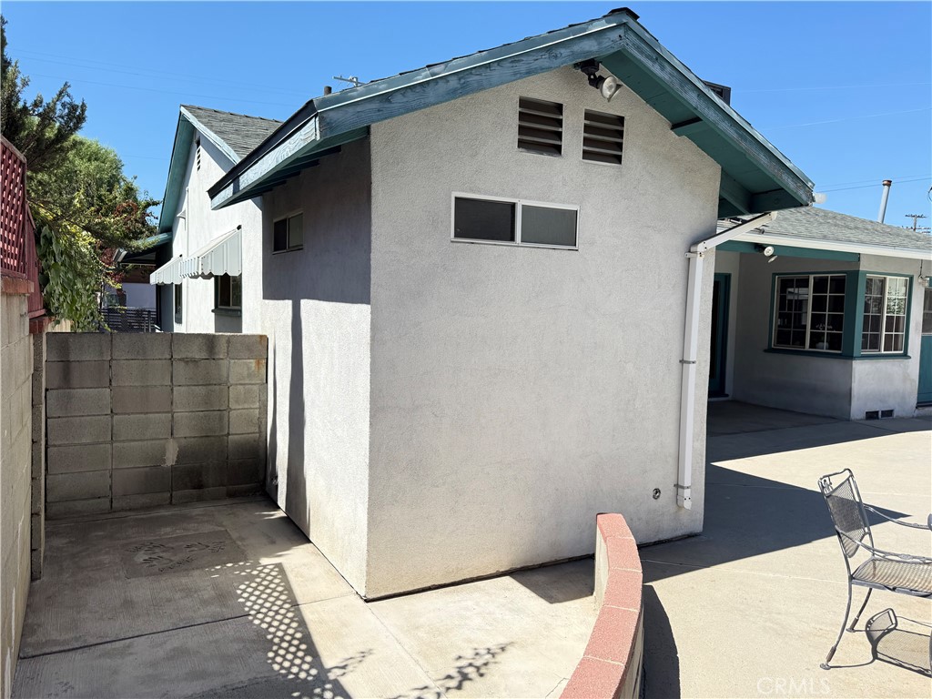 10430 McVine Avenue Sunland, CA 91040 - Photo 17 of 52 a front view of a house with parking