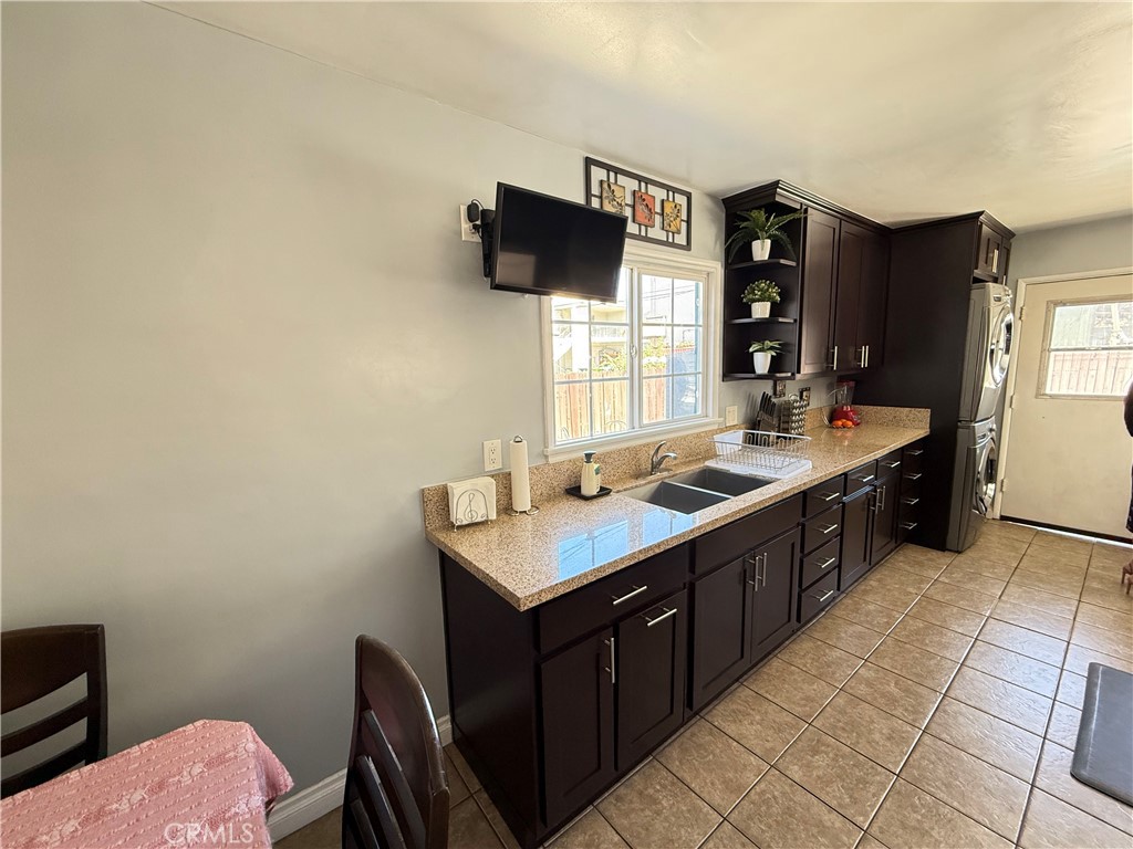 10430 McVine Avenue Sunland, CA 91040 - Photo 26 of 52 a kitchen with a sink counter top space and appliances