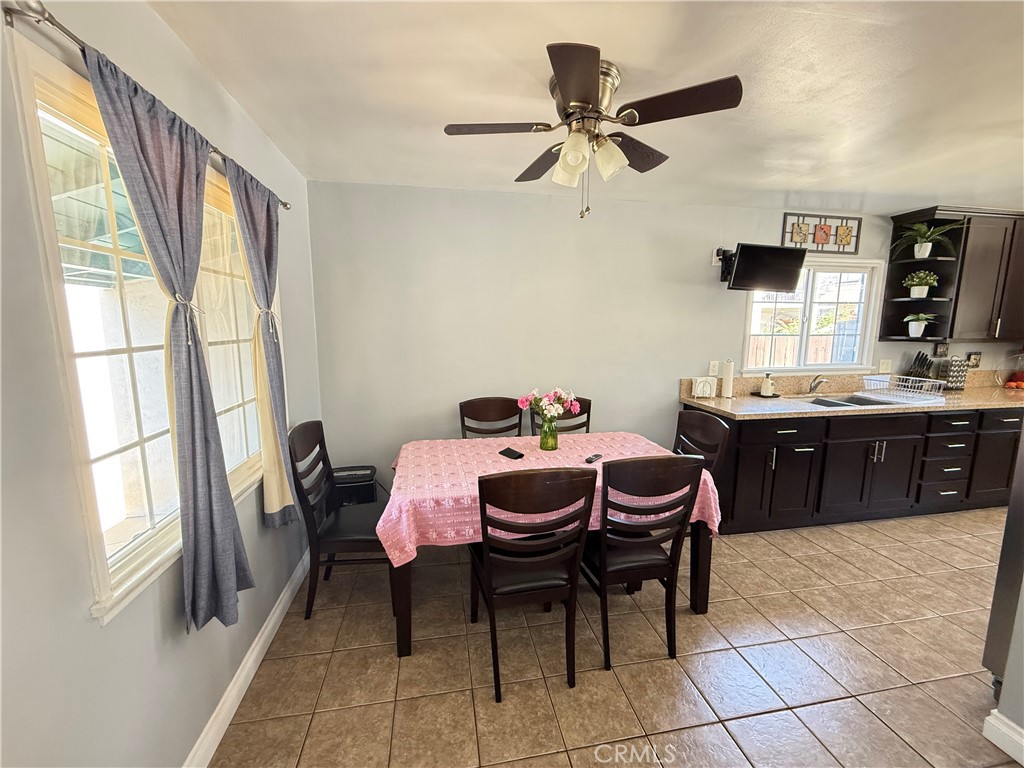 10430 McVine Avenue Sunland, CA 91040 - Photo 29 of 52 a dining room with furniture and window