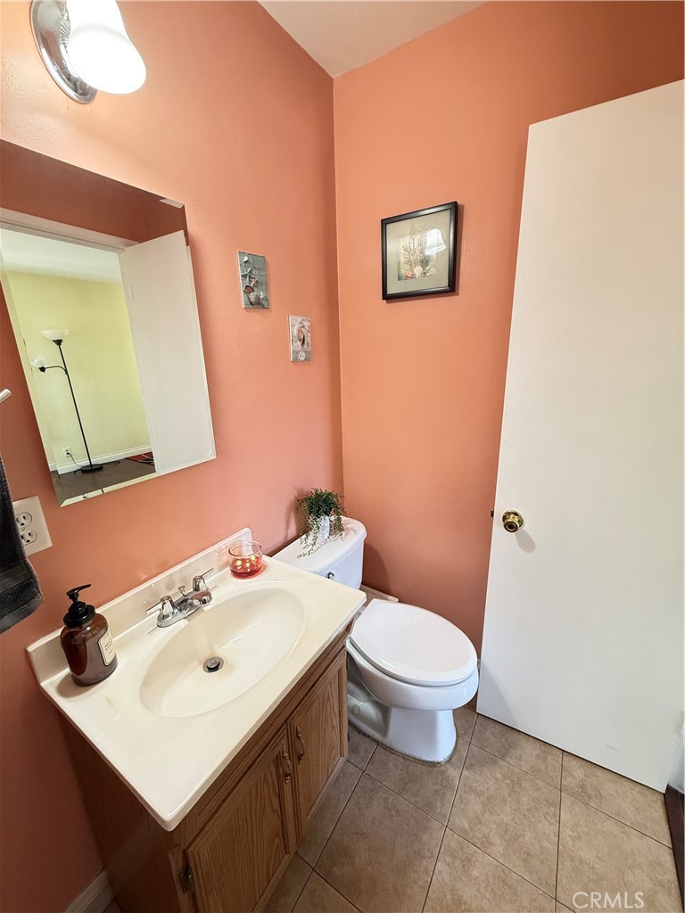 10430 McVine Avenue Sunland, CA 91040 - Photo 39 of 52 a bathroom with a sink mirror and toilet