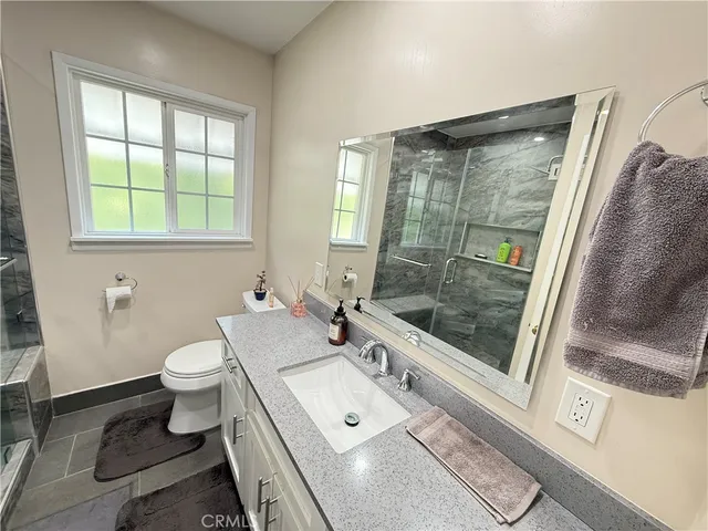 an empty room with wooden floor