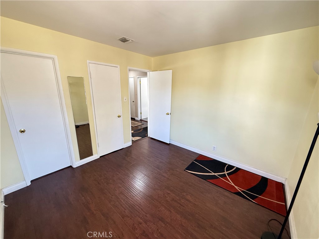 10430 McVine Avenue Sunland, CA 91040 - Photo 43 of 52 an empty room with wooden floor