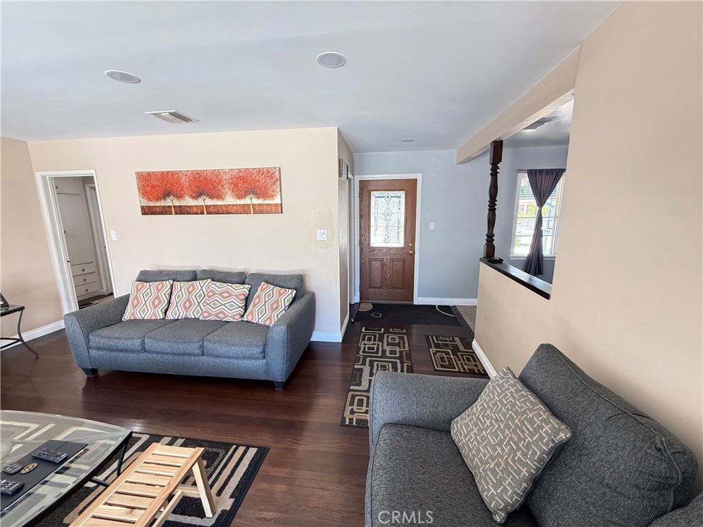 10430 McVine Avenue Sunland, CA 91040 - Photo 49 of 52 a living room with furniture and a window
