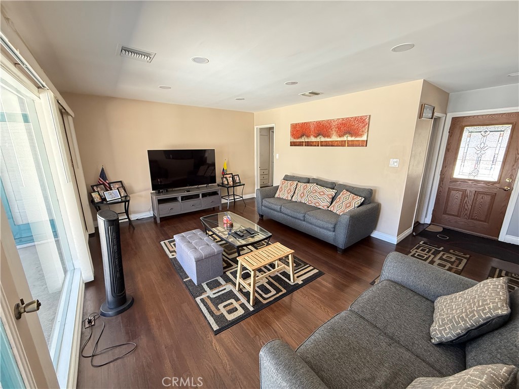 10430 McVine Avenue Sunland, CA 91040 - Photo 50 of 52 a living room with furniture and a flat screen tv