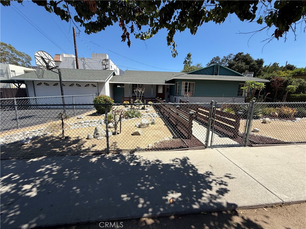 10430 McVine Avenue Sunland, CA 91040 - Photo 9 of 52 a view of a house with a yard