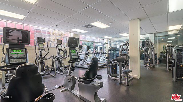 a city street lined with tall buildings and cars