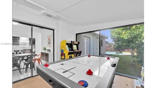 a very nice looking dining room with a large kitchen island