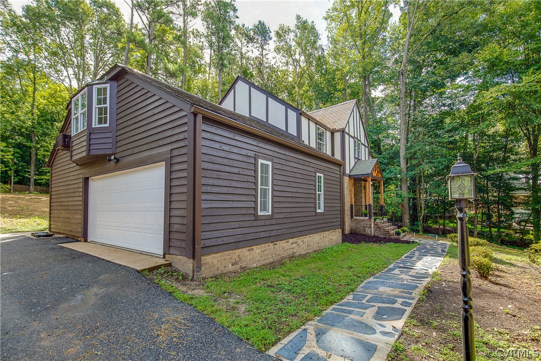 9340 Cardiff Loop Road North Chesterfield, VA 23236 - Photo 3 of 36 a view of a house with a yard