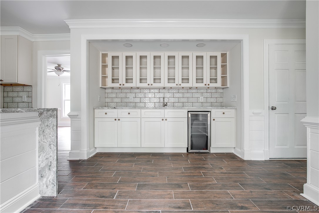 9340 Cardiff Loop Road North Chesterfield, VA 23236 - Photo 10 of 36 a view of a kitchen counter space and wooden floor