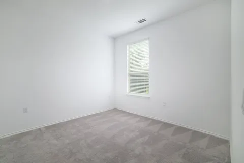 a view of hallway with livingroom