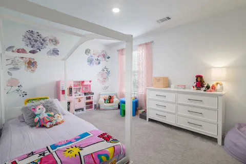 a view of a backyard with a swing