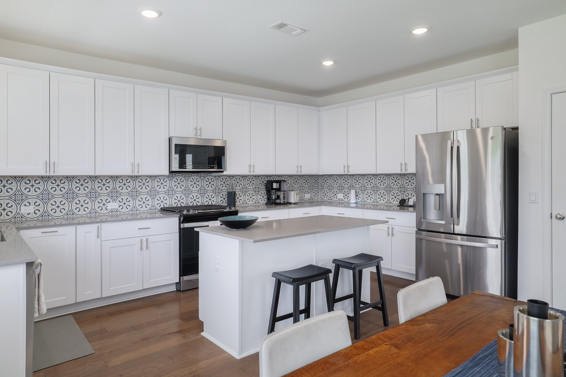 6829 Ellsworth Walk Austin, TX 78724 - Photo 10 of 32 Kitchen features center island and tons of storage.