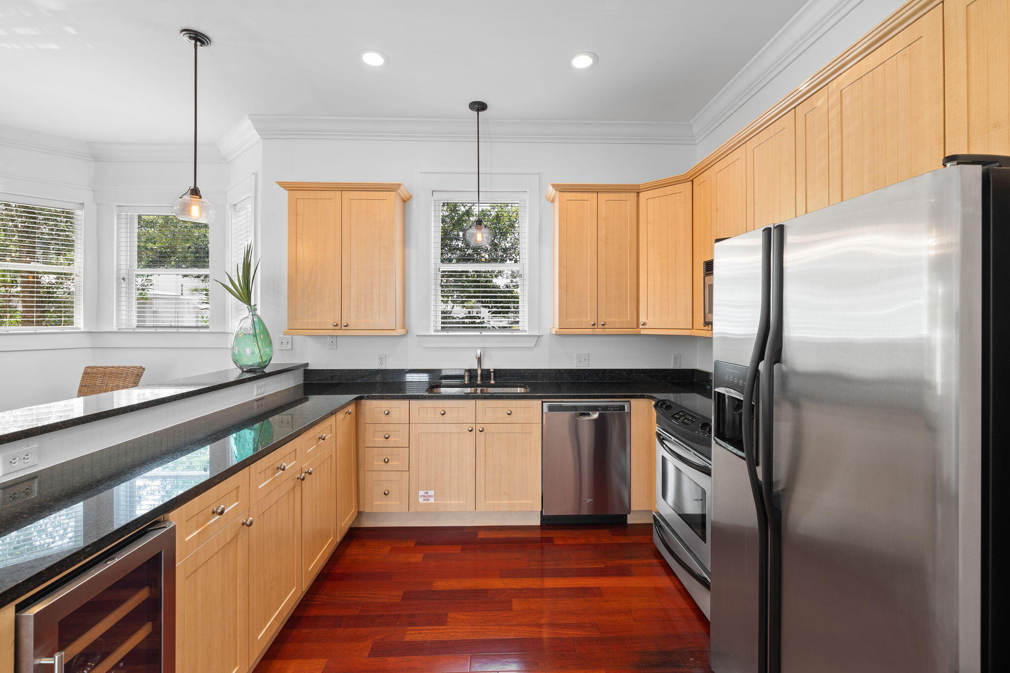 67 West Blue Crab Loop Inlet Beach, FL 32461 - Photo 19 of 78 a kitchen with stainless steel appliances granite countertop a refrigerator a sink and a stove