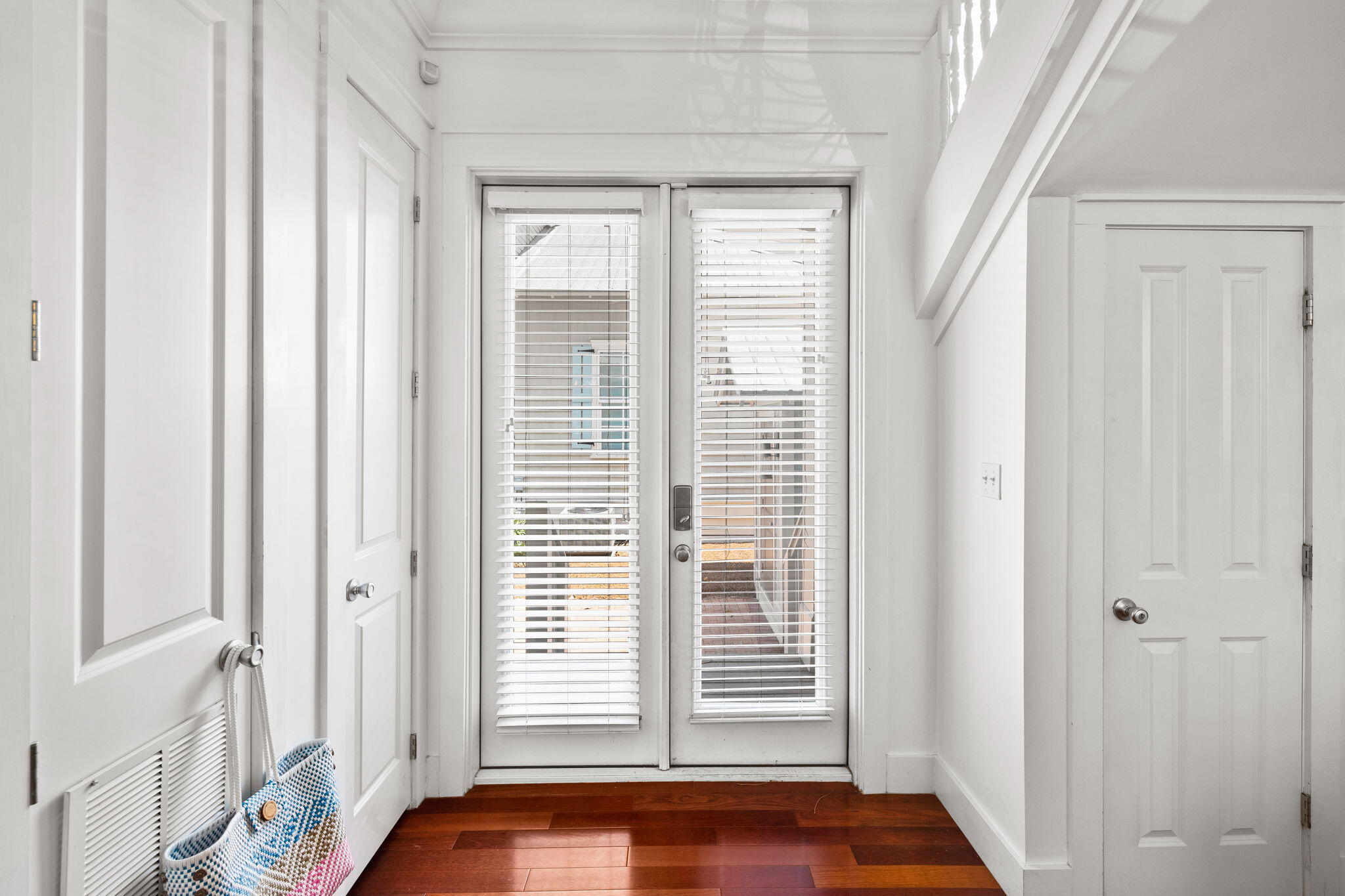 67 West Blue Crab Loop Inlet Beach, FL 32461 - Photo 20 of 78 a view of front door with wooden floor