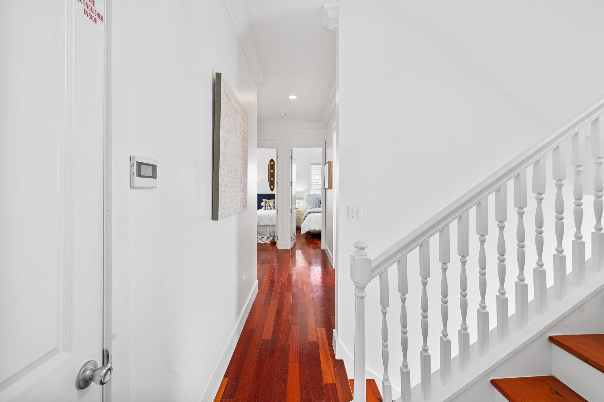 67 West Blue Crab Loop Inlet Beach, FL 32461 - Photo 35 of 78 a view of a hallway with wooden floor and staircase
