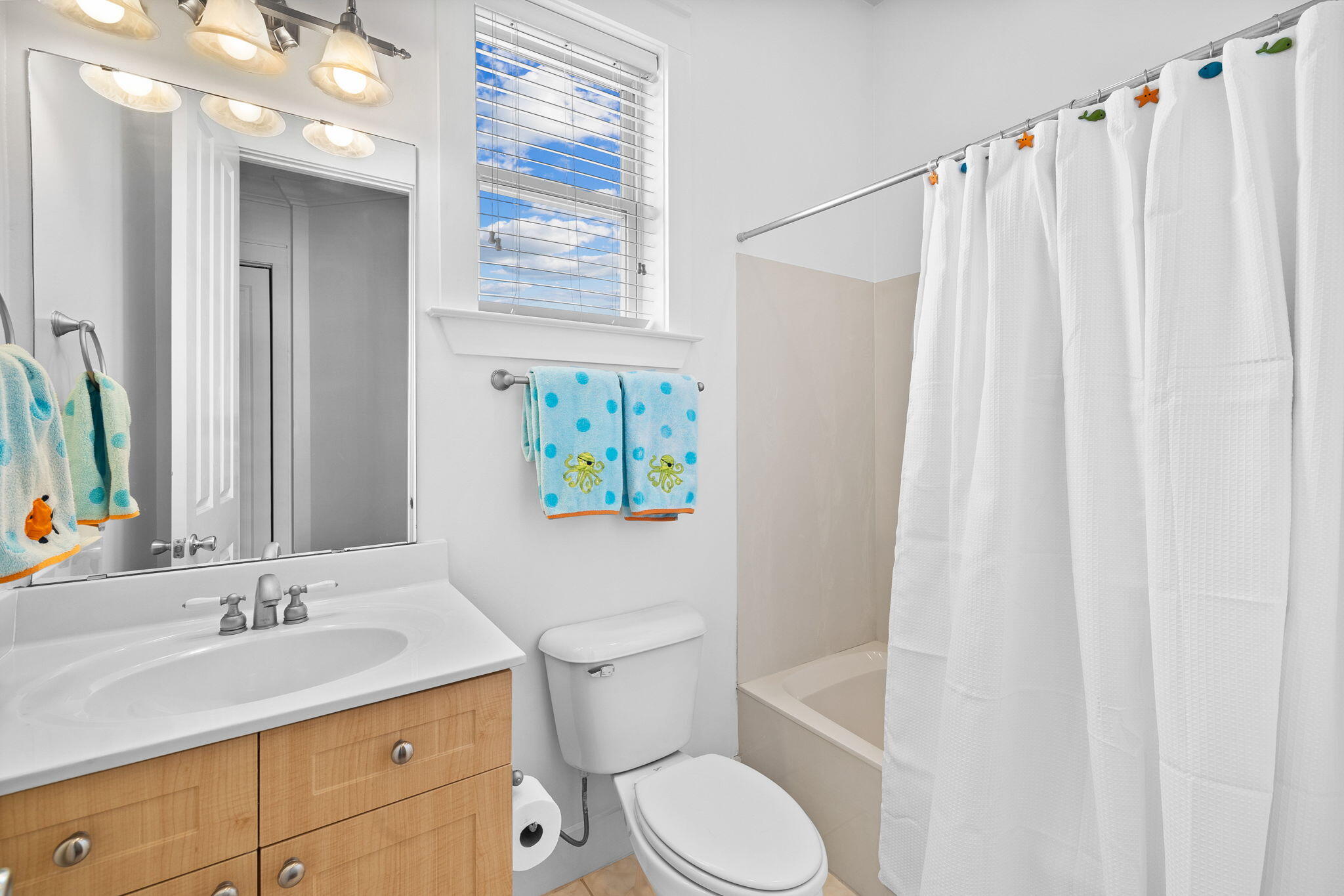 67 West Blue Crab Loop Inlet Beach, FL 32461 - Photo 36 of 78 a bathroom with a granite countertop sink toilet and shower