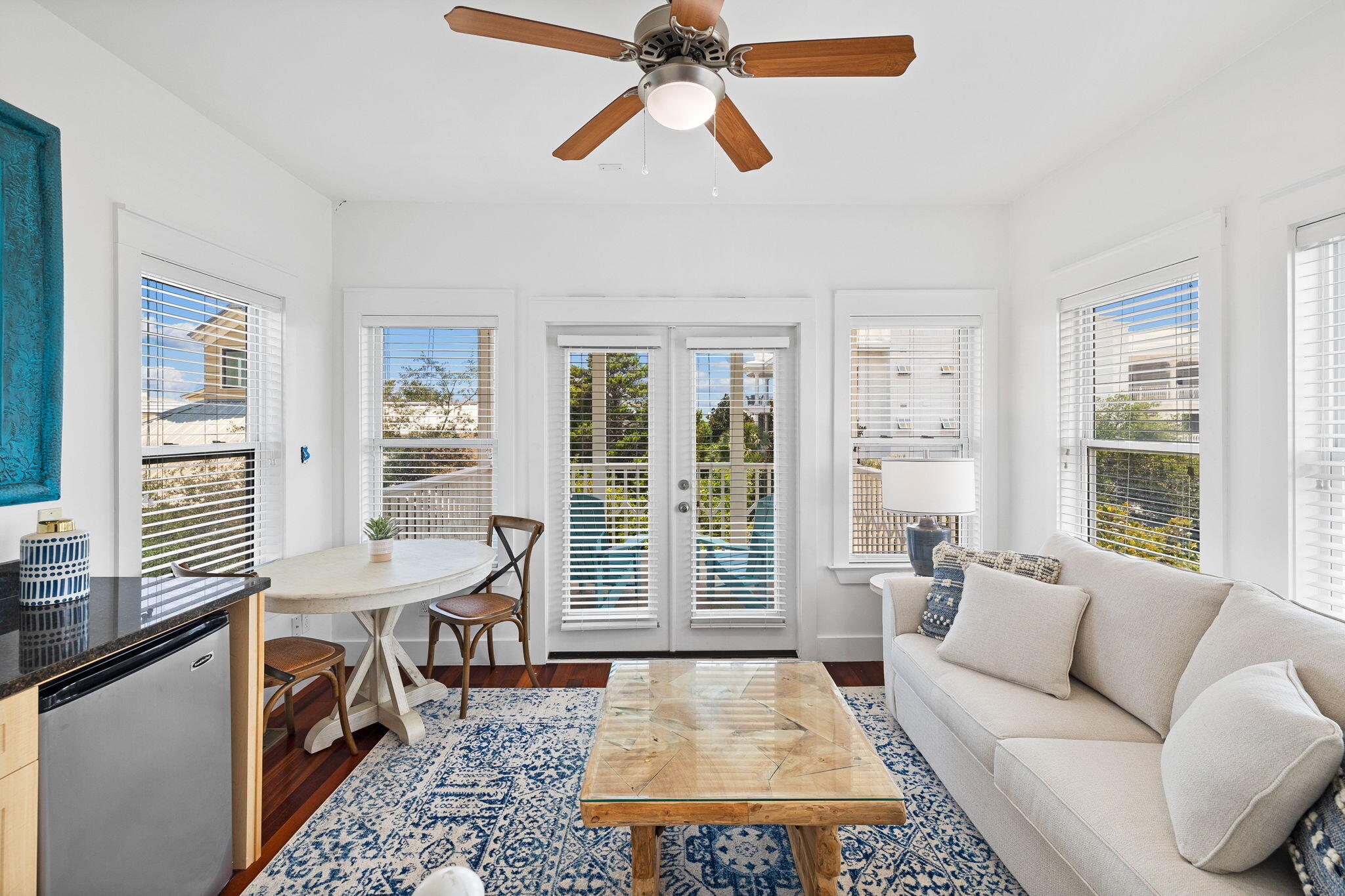 67 West Blue Crab Loop Inlet Beach, FL 32461 - Photo 44 of 78 a living room with furniture and a large window