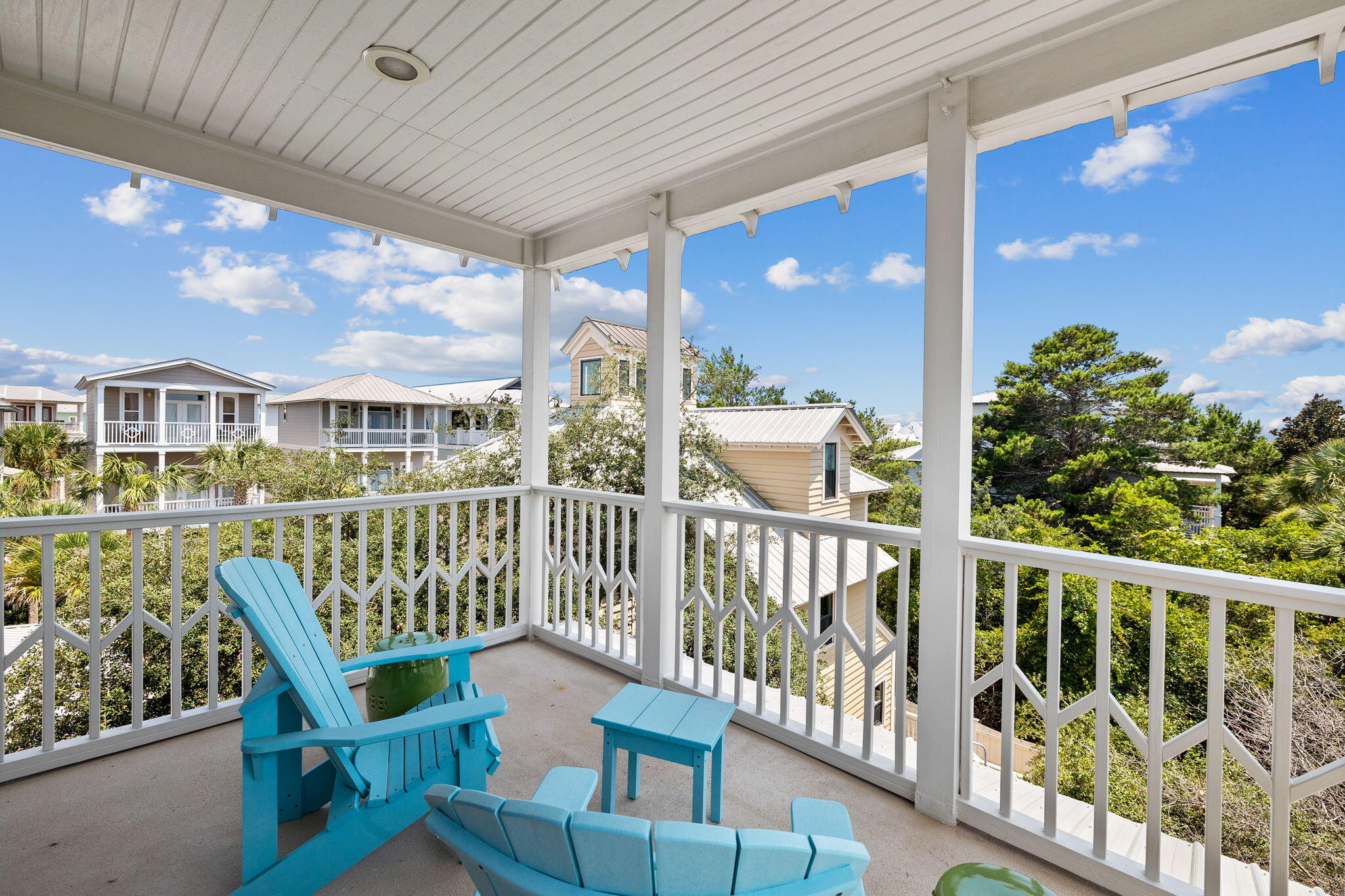 67 West Blue Crab Loop Inlet Beach, FL 32461 - Photo 47 of 78 a view of a chair and tables in the balcony