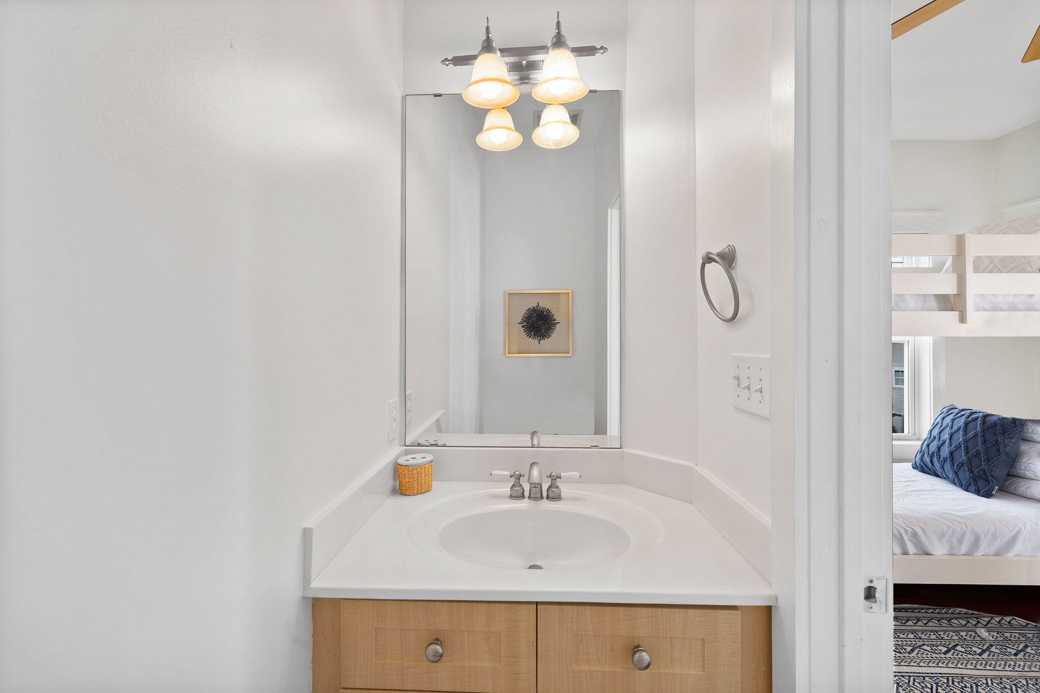 67 West Blue Crab Loop Inlet Beach, FL 32461 - Photo 53 of 78 a bathroom with a sink and a mirror