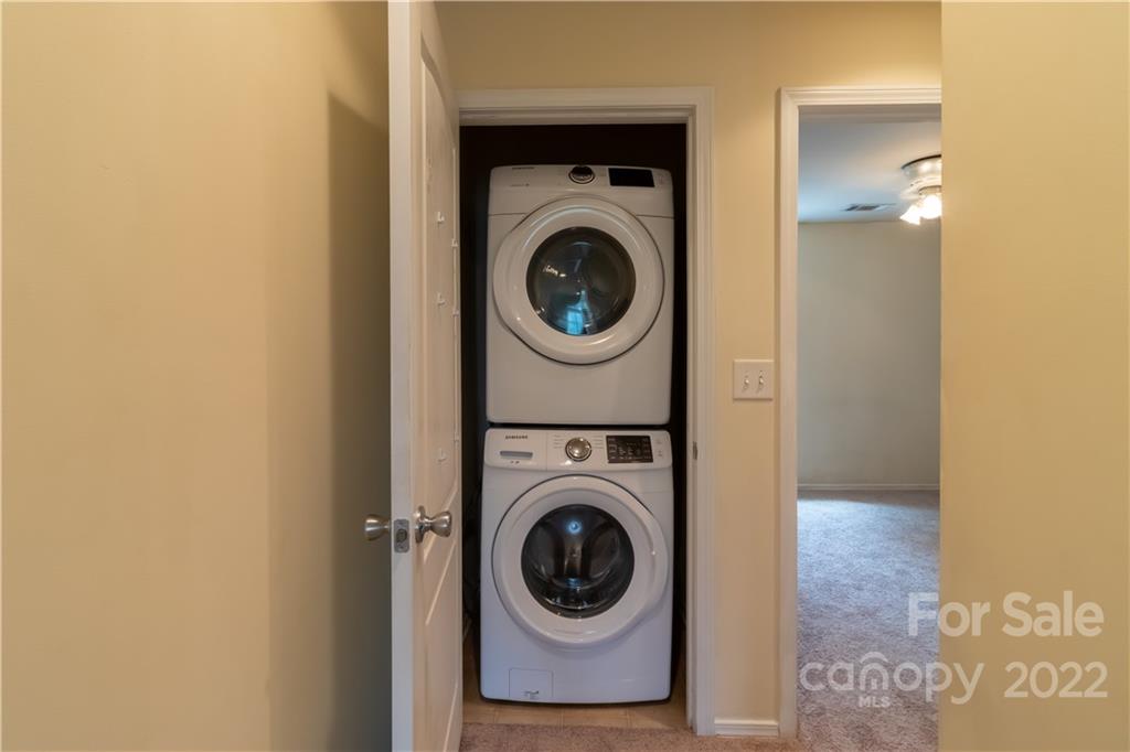 662 Potter Place Road Fort Mill, SC 29708 - Photo 16 of 28 a view of a hallway with washer and dryer