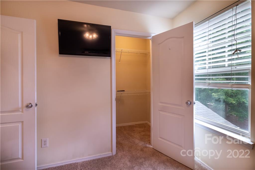 662 Potter Place Road Fort Mill, SC 29708 - Photo 18 of 28 a view of a living room with a flat screen tv