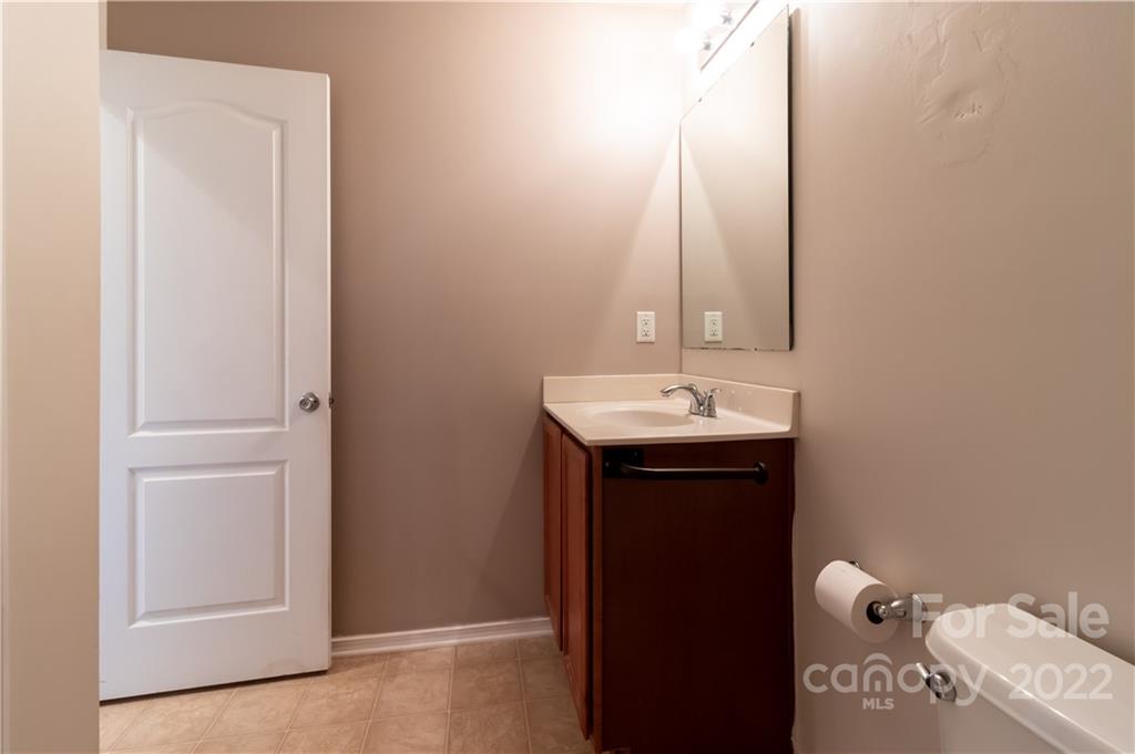662 Potter Place Road Fort Mill, SC 29708 - Photo 20 of 28 a bathroom with a sink and a mirror