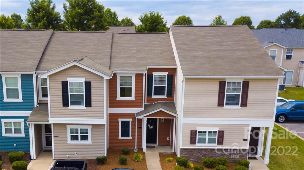 662 Potter Place Road Fort Mill, SC 29708 - Photo 2 of 28 a aerial view of a brick house next to a yard