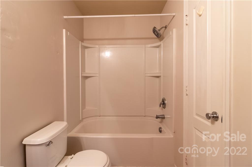 662 Potter Place Road Fort Mill, SC 29708 - Photo 21 of 28 a bathroom with a shower a toilet and a shower