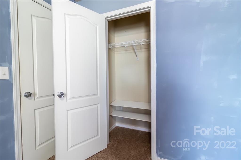 662 Potter Place Road Fort Mill, SC 29708 - Photo 22 of 28 a view of an empty walk in closet