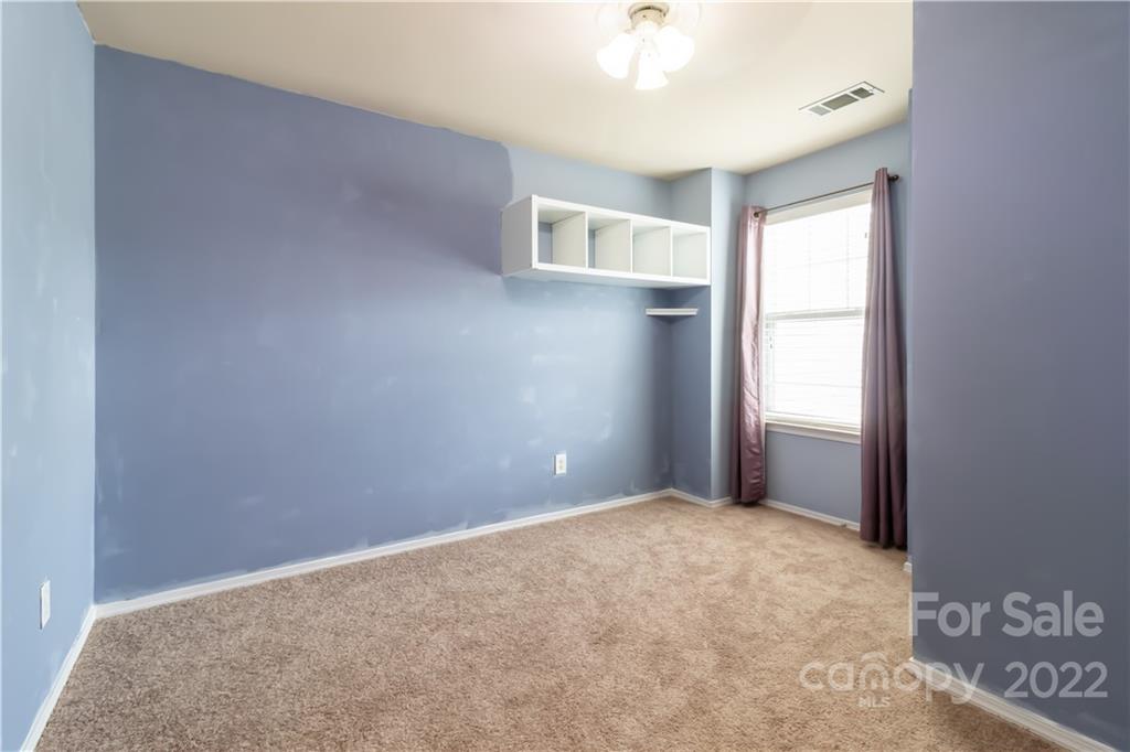 662 Potter Place Road Fort Mill, SC 29708 - Photo 24 of 28 a view of an empty room with a window