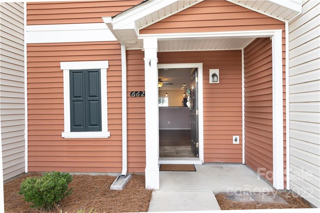 662 Potter Place Road Fort Mill, SC 29708 - Photo 3 of 28 a view of a brick house with front door