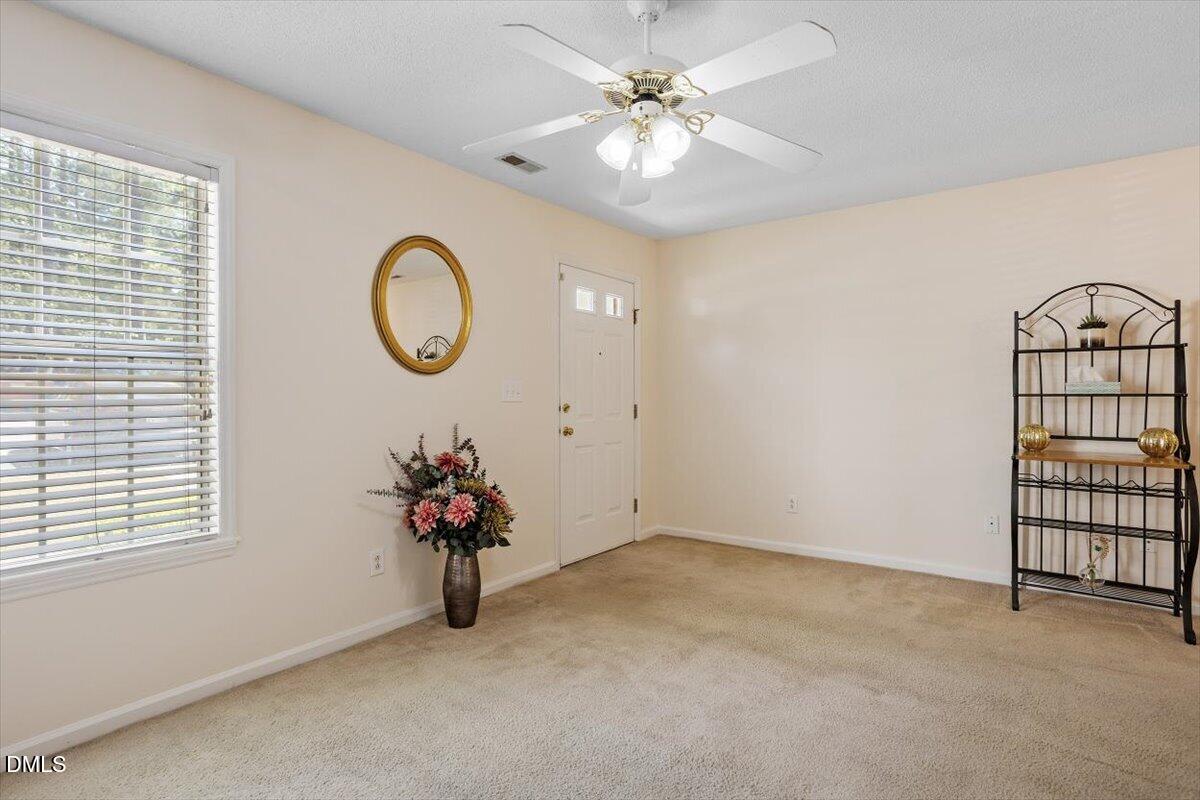 5503 Fieldcross Court Raleigh, NC 27610 - Photo 6 of 26 a view of entryway with livingroom