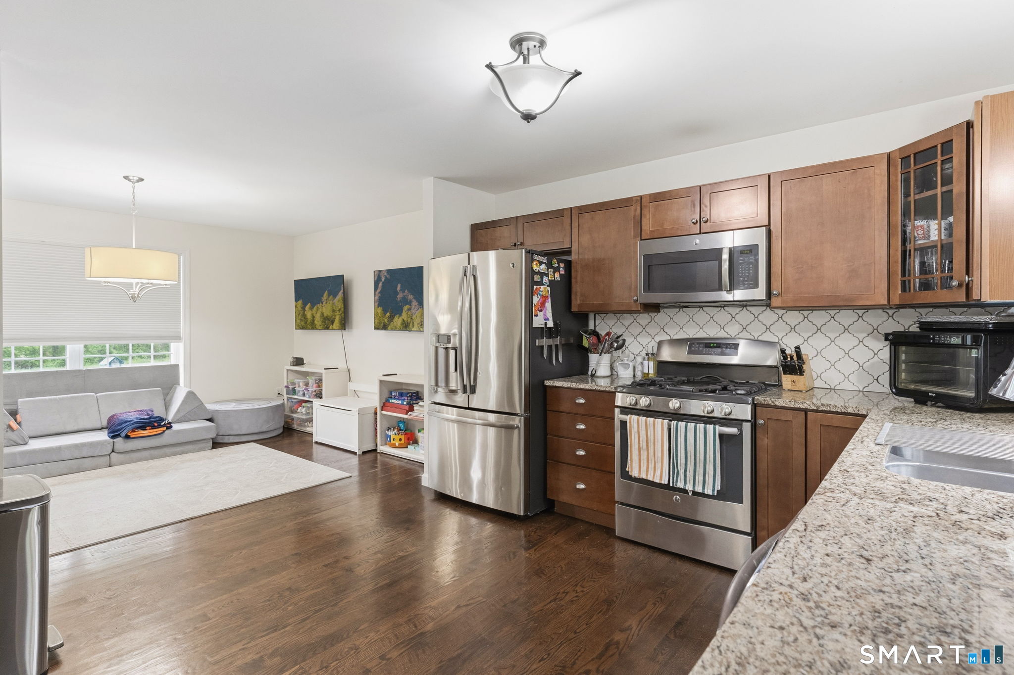 160 Canal Road Suffield, CT 06078 - Photo 40 of 40 a kitchen with stainless steel appliances granite countertop a refrigerator stove and sink