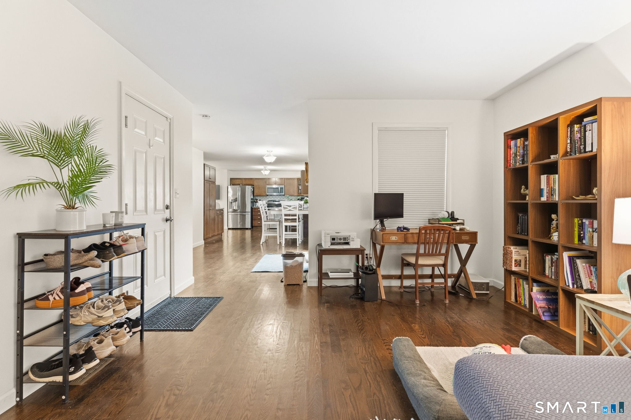 160 Canal Road Suffield, CT 06078 - Photo 16 of 40 a living room with furniture and a wooden floor