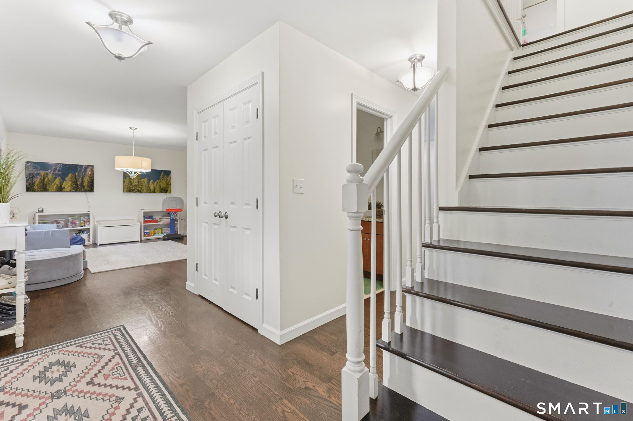 160 Canal Road Suffield, CT 06078 - Photo 18 of 40 a view of a livingroom with furniture and a hallway