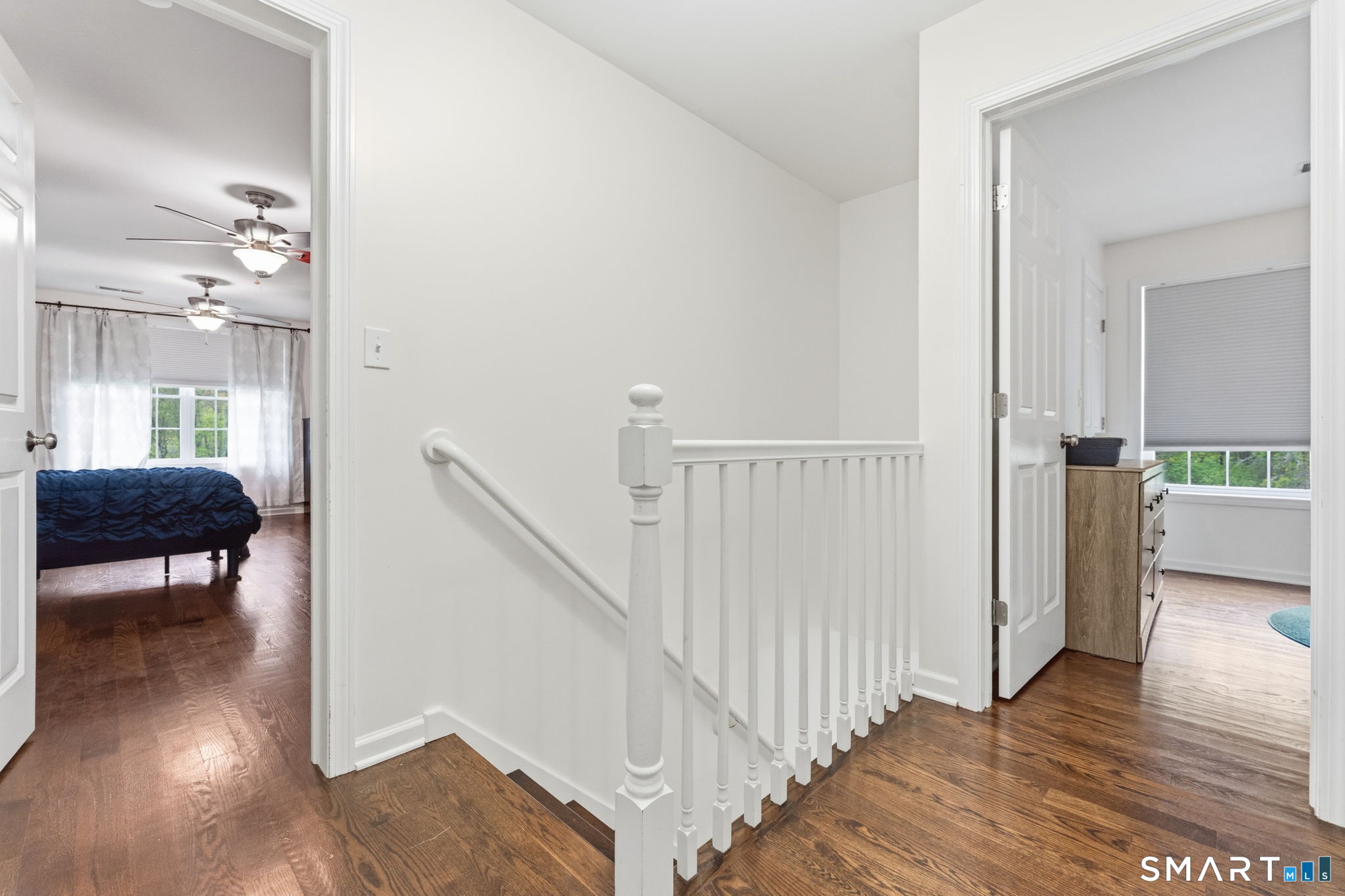 160 Canal Road Suffield, CT 06078 - Photo 19 of 40 a view of a hallway with furniture and wooden floor