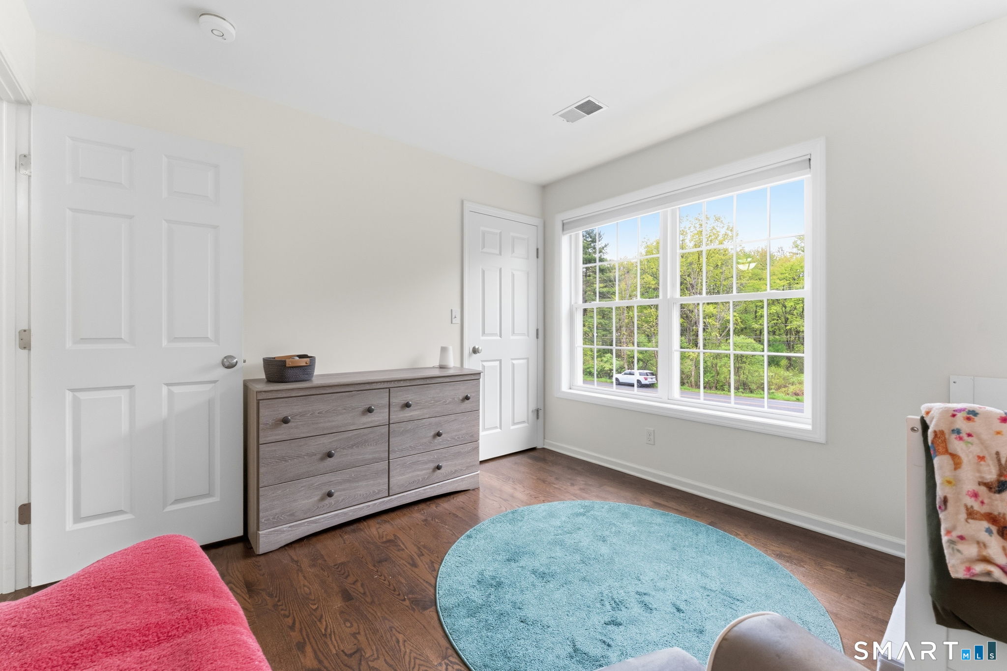 160 Canal Road Suffield, CT 06078 - Photo 29 of 40 a bed room with a bed and a window